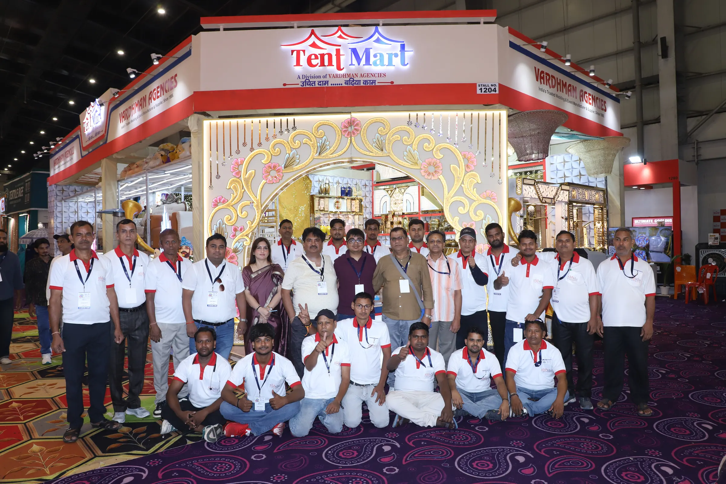 The TentMart team in white t-shirts at the TentMart exhibition stall