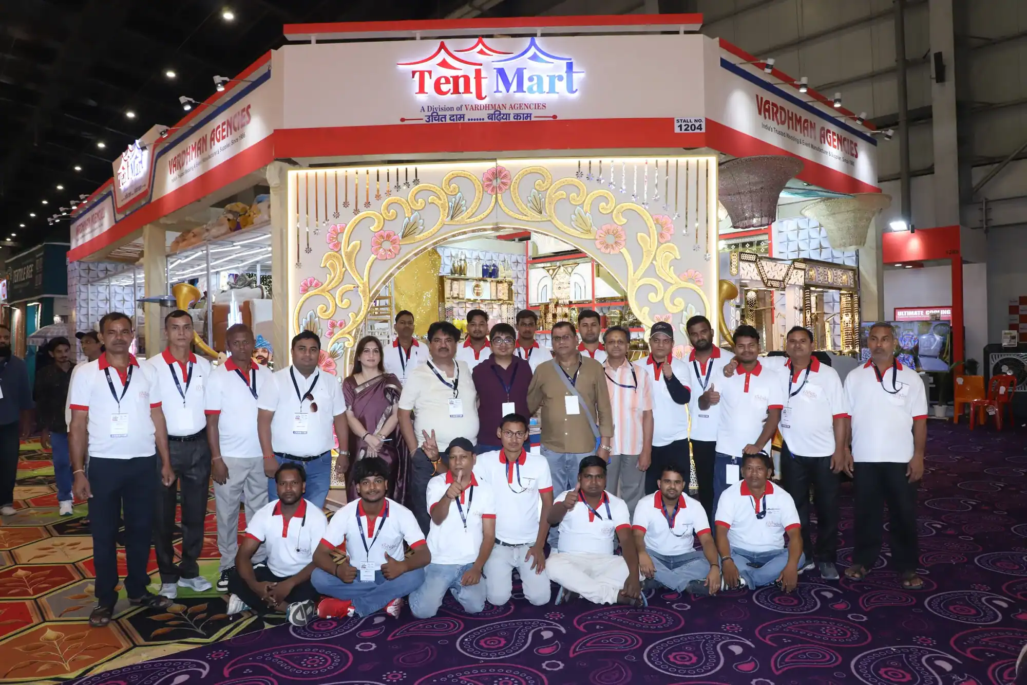 The TentMart team in white t-shirts at the TentMart exhibition stall
